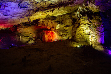 illuminated cave in different colors