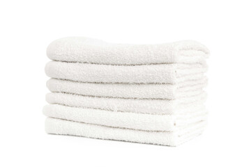 several white beach cotton towels folded on white background