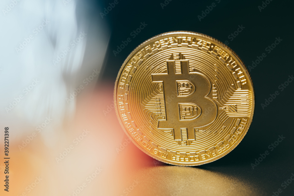Wall mural bitcoins and new virtual money. gold coin with b.mining icon or blockchain technology