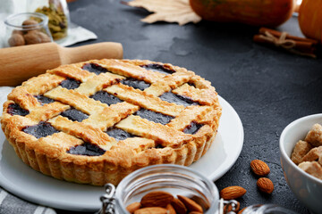 Close up of a berry tart pie on wooden table