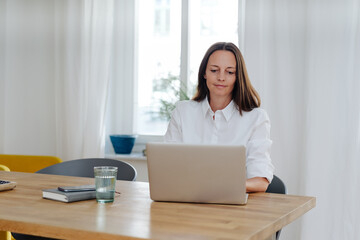 Dedicated businesswoman at work in her office