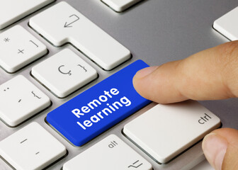 Remote learning - Inscription on Blue Keyboard Key.
