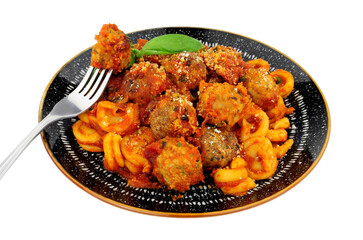 Beef and pork meatballs Al Forno with trulli pasta in tomato sauce meal isolated on a white background