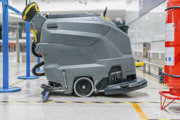 cleaning floor with machine