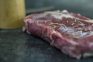 Fresh beef steak sliced on a background