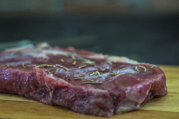 Fresh beef steak sliced on a background