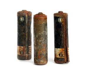 Rust,Old battery 1.5 V leak isolated / Hazardous waste concept, on white isolated background.