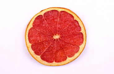 Naklejka na ściany i meble White background with dried grapefruit