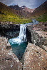 Fototapeta na wymiar A Little Waterfall In The Countryside in Iceland