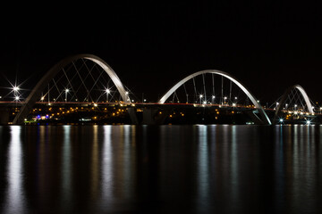 Obraz na płótnie Canvas Night photo of the JK Bridge over Lake Paranoá in Brasilia, Brazil.