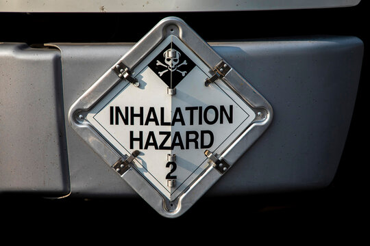 A diamond shaped sign stating Inhalation Hazard with a skull and crossbones