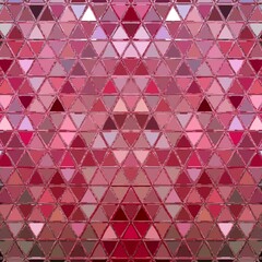 abstract geometric triangular background in many shades of pink and dark redy purple