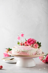 Birthday party concept with rose white cake