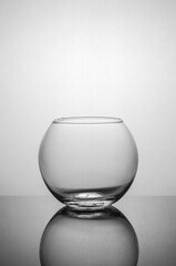 Transparent vase on a dark background with back light