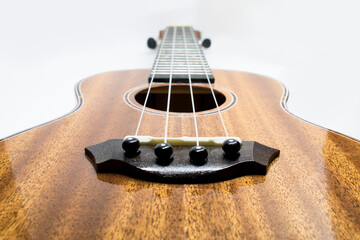 Soprano ukulele Music with white background low and straight perspective