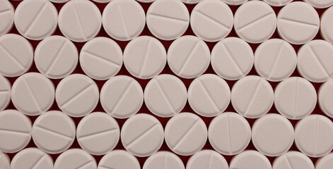 Background of white pills ordered