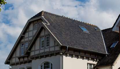 beautiful house roof with black tiles