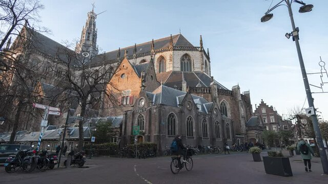 4k rotating time lapse of the Saint Bavo church at sunset into the night with rotating stars in Haarlem, the Netherlands
