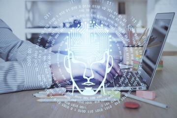 Man typing on keyboard background with brain hologram. Concept of big Data. Double exposure.