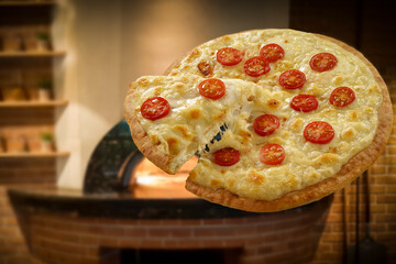 Pizza with tomatoes with a free space for toppings in a romantic interior