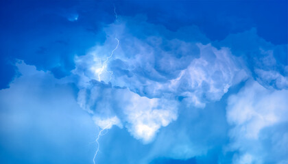 Lightning strikes between stormy clouds.