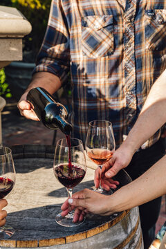 Man Pours Wine at a Tasting