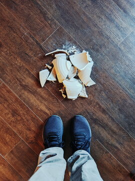 Standing Above A Broken Dish