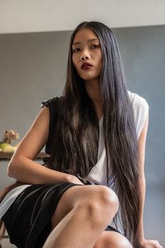 Fashion Portrait Of Beautiful Asian Woman With Dark Long Hair