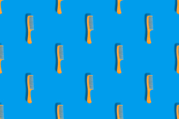 Seamless patterns. Seamless background from hairdressing combs. Combs background.