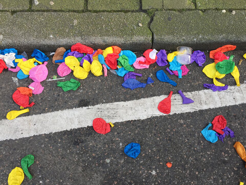 street littered with balloons
