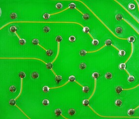 Close-Up a lead solder a pin of a pasive electronic device such as L, R, C, LED  and etc on a pcb board.