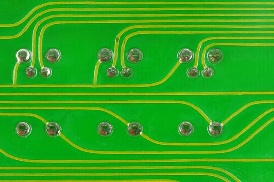 Close-Up A Lead Solder A Pin Of A LED And A Transistor On A Pcb Borad.