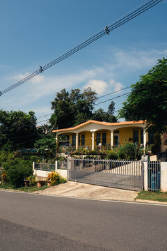Gated yellow hispanic house