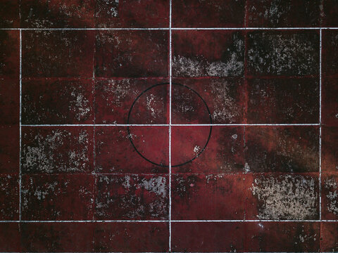 Old shabby tennis court with marking