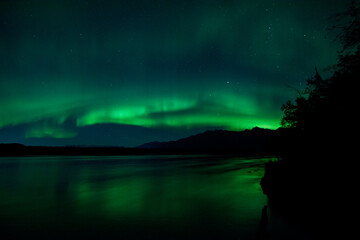 Aurora over Knik River, Alaska.