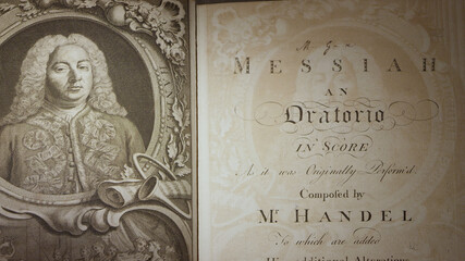 Handel's Messiah 1st edition printing from the 1700's tilting down the pages.