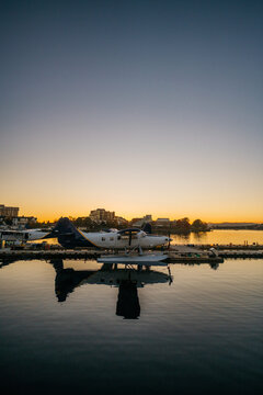 Seaplane against sundown sky