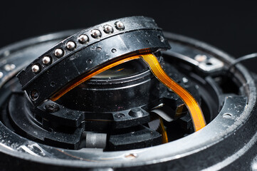 A ribbon cable for connecting the lens to the camera via the bayonet. Photo equipment repair