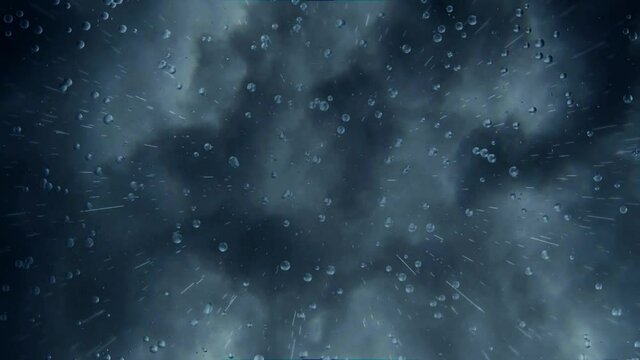 A gloomy moving background with dark stormy clouds hovering heavily in the sky with rain falling down directly onto a glass plane creating droplets clinging onto glass pane.