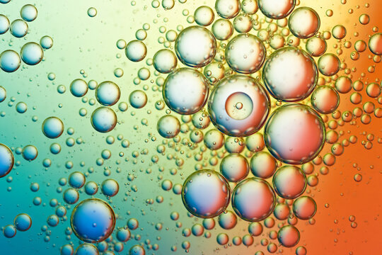 Oil Drops On Water Background