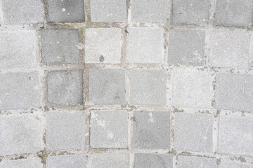 Abstract weathered textured white brick wall background. Brickwork stonework interior, rock old clean concrete grid uneven, horizontal architecture wallpaper.