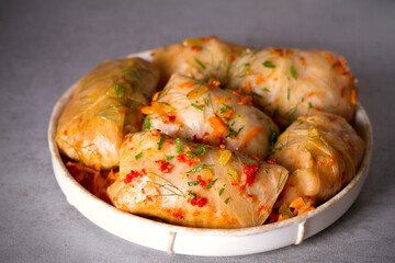 Cabbage rolls with meat, rice and vegetables. Chou farci, dolma, sarma, golubtsi or golabki