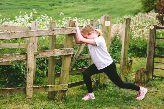 Young teenager running in the countryside