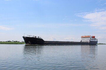 The ship goes on a calm river