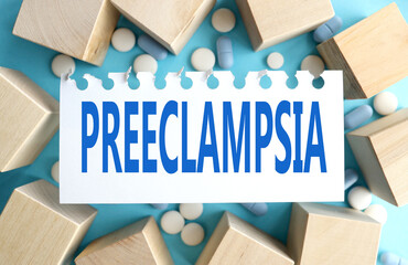 preeclampsia, text on white paper ON blue background