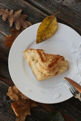 Delicious pastry croissant in a white plate 