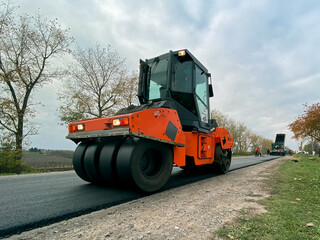 Road repairs, warning signs. Track laying concept