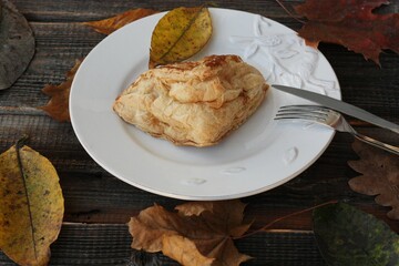 Delicious pastry croissant in a white plate 