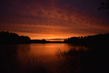bright orange sunset on the lake