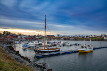 Fototapeta na wymiar Boats in the Tjotta harbor, ,Helgeland,Nordland ,Norway,scandinavia,Europe